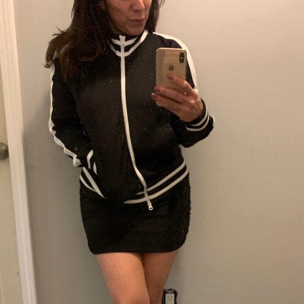 Black w/white stripe jacket with shoulder cutouts